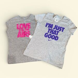(2) Girls Nike Graphic Tees (medium)